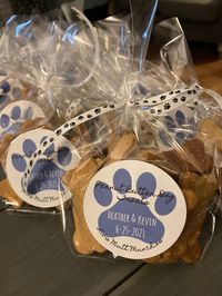 This listing is for organic dog treat wedding favors! They can also be made into any other kind of favor for a party. They are sold in multiples of 12.  Each favor bag contains: -2 ounces of treats in the flavor of your choice -customized label -paw print ribbon What to include in the personalization section: -Name of the Bride and Groom/the title you want on the label -Wedding date/event date -Color of the paw print (please list the color and send me a picture of your color) All of my treats ar