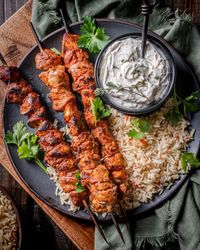 Citrus achiote chicken skewers pepper rice