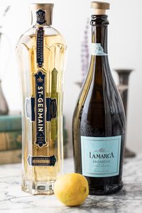 French 77 Cocktail ingredients - St. Germain elderflower liqueur and a sparkling wine - in this case a prosecco and lemon juice! #french77 #stgermaincocktails 