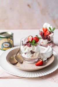 Crisp sweet layers of meringue combined with light mint whipped cream and juicy roasted strawberries. A British classic, the Strawberry Eton Mess makes a perfect summer dessert. By Emma Duckworth Bakes