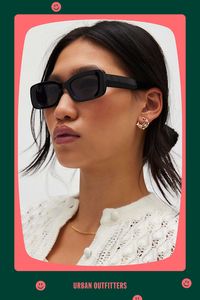 Bold sunglasses with a rectangle silhouette for a boxy look. Features Paige plastic rectangle sunglasses Chunky sunglasses Rectangle sunglasses silhouette 100% UV protection Content + Care Plastic Wipe clean Imported | Paige Plastic Rectangle Sunglasses in Black, Women's at Urban Outfitters