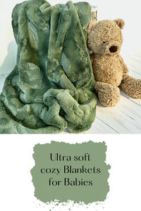 Wrap your little one in luxurious comfort with our Double-Sided Faux Fur Baby Blanket! This stunning blanket features two beautiful, cozy sides in an earthy ivy green. Whether you're cuddling during story time, adding a cozy touch to their nursery, or keeping them snug in the car seat, this blanket is an absolute must-have for every parent.  Crafted with love and attention to detail, this blanket is made from buttery soft, high-quality faux fur fabric that's gentle on sensitive skin. Both sides are irresistibly plush, making it the perfect blanket for babies, toddlers, or even older kids. It's a keepsake-worthy piece that’s as beautiful as it is functional!