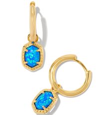 From Kendra Scott, the  Daphne Framed Huggie Hoop Earrings feature:Hoop earrings14k gold plated brassPost closureApprox. 0.58" outside diameterImported.