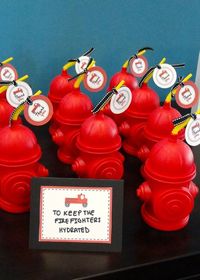 firetruck theme birthday party ideas favors fire hydrant cups to "keep the firefighters hydrated"