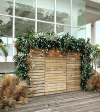 Rustic greenery photo wall