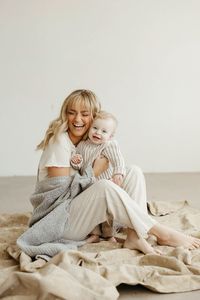 mommy and me photoshoot, studio, family studio photos, family photo inspiraton, mom and son, neutral outfit inspiration, motherhood // photo by ashley hinners