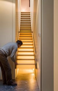 A staircase that opens up. Looks like it leads to another hallway!