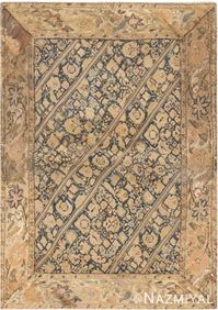 Here is a beautiful woven and comely antique rug – an antique Suzani embroidery, woven in Persia nearly four hundred years ago, during the seventeenth century. Profoundly beautiful and remarkably preserved for its age, this 17th century embroidery is both an alluring and culturally significant work of art. Grand ecru palmettes and delicate floral sprays create a classical arabesque that is divided by a series of diagonal strap work bands.