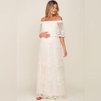 A Lace Mesh Overlay Maternity Maxi Dress Featuring An Off Shoulder Neckline With A Ruffle Trim, A Cinched Elastic Waistline, And A Scalloped Hemline. Dress Is Double Lined To Prevent Sheerness. B39 Zg