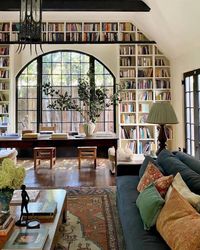 Historic Landmark living room with large built-in Bookshelves around window