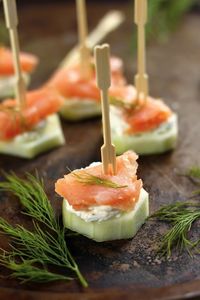 Everyone loves bagels and lox, so why not try this lighter carb-free alternative? Slice cucumbers into rounds, spread some cream cheese, and top with a slice of smoked salmon for a perfect bite-sized snack. You can even embellish your cream cheese by mixing in capers, chives, horseradish, or dill. Or add a slice of tomato! This snack gives you lots of room for creativity.Image via Baker By Nature