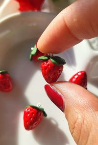 Strawberry Charms are handmade with polymer clay, resin, and silver plated copper wire.  Can be made with gold wire upon request! Please send me a message if you have any questions or want to customize anything!