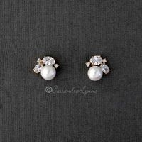 A classy little stud earrings designed with ivory glass pearls and topped with oval and tiny round cubic zirconia stones. A great style for any evening out! They are .5 inches long with post pierced backs. Rhodium, or gold plated, AAA grade CZ, lead and nickel free.