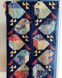 Megan Grewal on Instagram: "🐦Sparrow Quilt 🐦 Another beautifully executed quilt by @mckimk328 using @tilda_usa fabric line “Chic Escape” and a few other beauties from her stash 😊 All quilting is custom ruler work and freemotion. Sew much fun to work on! #thewittystitcher #quiltersofinstagram #quilters #quiltersofinstagram #quiltblock #friends #tilda #tildausa #tildafabric #chicescape #freemtionquilting #longarmquilting #longarm #longarmquiltingservices #penandpaper #penandpaperpatterns #sparr