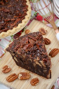 This easy chocolate pecan pie recipe is the perfect dessert for your next holiday gathering! It's rich and chocolatey with a fudgy texture.