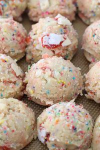 These Strawberry Pop Tart Cookies are soft and buttery sugar cookies that are loaded with chopped Strawberry Pop Tarts and colorful sprinkles.