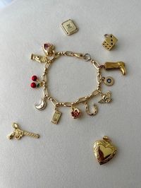 *PLEASE LIST ALL CHARM NUMBERS AND CHAIN NUMBER IN PERSONALIZATION SECTION Care: To care for your bracelet, avoid wearing it in the shower, pool, or ocean as excess exposure to moisture may cause elements of the jewelry to tarnish or degrade. Personalize your style with a custom charm bracelet! Select from a range of charms, including initials, birthstones, and symbols, to create a one-of-a-kind piece. Perfect for gifting or everyday wear, this handmade necklace is designed to reflect your unique personality. Whether you're celebrating a special occasion or simply adding to your jewelry collection, this charm necklace is a timeless keepsake! xoxo -natalie