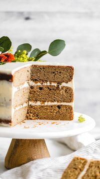 This spice cake recipe is full of delicious brown butter and is covered in brown butter cream cheese frosting. Not to mention the candied nuts between each layer! It's the perfect holiday cake recipe. #spicecake #spicecakerecipe #brownbutter #butternutbakery