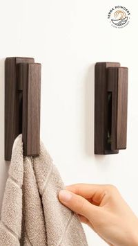 Unique and almost magical towel holders! These real walnut and beechwood marble slide towel holders are organic style, functional décor at its finest. 🤩 Easy to install, no tools required! 🙌 From Nordic and modern style to farmhouse and entryway design, they're great for dream house and apartment décor, wall decorations, and hanging kitchen towels! #homedecor #towelrack #bathroomdecor #dreamapartmentdecor #homedecorideas #towelholder #roomdecor #walldecor #handtowelholderideas #entrywaydecor