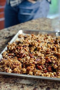 This spiced Christmas Granola recipe is an easy, healthy, homemade and festive treat packed with wholesome grains, nuts, and fruit, that tastes like Christmas in every bite. This winter granola recipe is also great for packaging up for Christmas food gifts!