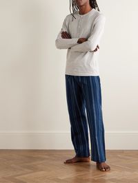 Derek Rose designs function-first apparel to enhance your lounging experience. These 'Kelburn 38' pyjama trousers are cut from brushed cotton-flannel patterned with tonal-blue stripes inspired by Moroccan textiles. The elasticated drawstring waistband and snap-fastening fly make them especially practical.