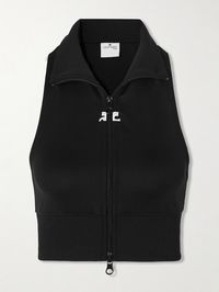 When paired with the coordinating track pants, Courrèges vest is the ultimate early aughts outfit. It's cut from smooth jersey for a slim fit and appliquéd with the label's futuristic logo at the chest. Use the zip to create a deeper neckline.