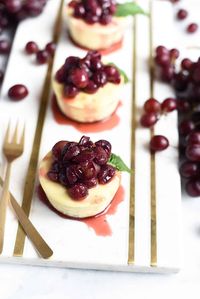 Mini Cheesecakes with Champagne Roasted Grapes - superman cooks