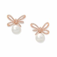 Lyla’s Bow earrings in rose gold, diamonds and South Sea pearls (=)