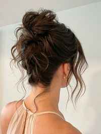 From balletcore-inspired ponytails to the iconic sleek bun, wedding hair has never looked so good.