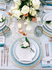 Nothing says clear summer skies and refreshing dips like baby blue. From the tinted goblets and painted porcelain chargers to pooling linens and pastel blooms seen here, there's no shortage of ways to incorporate the hue into your summer wedding décor. See more pretty wedding color schemes at the link. // Photo: Ryan Ray, Planner: Amorology, Florals: Oak & The Owl, and Rentals: Casa De Perrin, Folklore Rentals + Bright