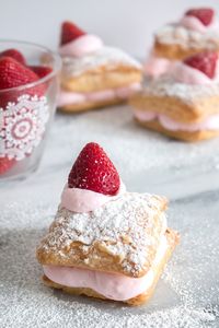 A super easy way to make cream puffs. All you need is store bought puff pastry, mousse mix, and something to make it look fancy (like fresh berries) This is a great summer dessert you can throw together in no time!