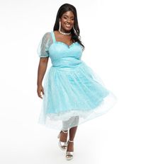 This sweet Princess Cinderella style dress, in collaboration with Disney, is crafted in beautiful light blue sequins throughout. The sweetheart neckline comes with a darling ruffle trim. Complete with a back zipper and elastic cuffs and shoulders.