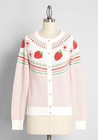 We are ‘berry’ excited to bring you this white cardigan sweater from our ModCloth namesake label! The quirky, exclusive Fair Isle pattern at the yoke features bright red strawberry motifs with pink and red flowers that are framed by red, green, and pink-hued zig-zags, along with miniature red polka-dots scattered all over. Made from a super soft cotton knit, this button-up sweater will be a sweet addition to your ensemble, year-round!