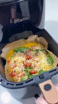 Air-Fryer Frittata . 👉 Ingredients 4 large British Lion eggs 50g/2oz mature Cheddar cheese, grated Mushrooms 4 cherry tomatoes Handful of chopped spinach Fresh chopped herbs Green onion Pinch of salt Method Preheat the air fryer to 350 F / 180 C Line a deep 7-inch baking pan with parchment paper, then oil the pan and set aside In a bowl, whisk together the eggs and cream Add the rest of the ingredients including the sea salt flakes salt to the bowl and stir to combine Pour the breakfast frit...