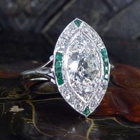 Absolutely Gorgeous Art Deco Navette Shaped Diamond and Emerald Cluster Ring The central 0.92ct old European cut diamond has well matched diamonds on both the top and bottom creating a larger marquise cut diamond aesthetic. Surrounded by twelve old eight cut diamonds and ten calibre cut emeralds #navettecluster #oldeuropeancutdiamond #artdecoring #emeraldring #vintagering #antiquering #marquise #navette