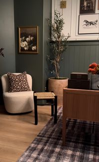 The green walls and wainscot are painted Benjamin Moore Rainy Afternoon. Design by Madison Timberlake