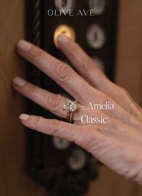 14K Yellow Gold | Amelia features a classic oval shaped center stone set in a traditional solitaire setting on a half round shank. Classic features an elegant assortment of round stones on a half eternity shank. Offered in a variety of stone and setting styles.