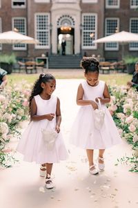 Their outfits are adorable! See more from the wedding planner here. #weddingideas #weddingaisle #flowergirlideas