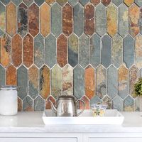 The Rusty Brown & Gray Slate Mosaic Tile is ready to elevate your kitchen and bathroom projects! The captivating look of the picket tiles is a riddle for those who prefer eye-catching designs. While the brown and gray slate creates a rustic appeal with its honed and rough finish, the picket shape of the tiles adds a modern flair to this mosaic and this combination makes this mosaic a statement maker piece. | Mosaic Kitchen 2" x 6" Slate Mosaic Wall & Floor Tile Slate in Black / Gray | 6 H x 2 W