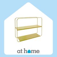 Transform your blank walls into a canvas of possibilities. Add a splash of modern flair to your home with the Oh Joy! Gold Metal Wall Shelves. Sporting a vibrant yellow hue, these shelves are crafted from sturdy metal material, promising both style and function in equal measure. Put your favorite trinkets, books, or plants proudly on display, and watch your living space come alive. The sleek design ensures these shelves blend seamlessly with any decor, from contemporary chic to playful eclectic.