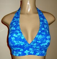 Tie halter neck bikini top. Swimwear halter top with thick tie back. Panel under bust for support. This halter swimsuit top provide great side arm coverage. Match it with any bikini bottom or even with shorts. Can be ordered in other colors or prints. https://www.mirasolswimwear.com/pages/fabrics-for-swimwear Please provide your bra size, bust, and rib measurements.