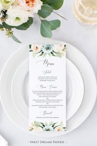 Wedding menus in dusty blue and blush watercolor florals are a perfect finishing touch for a wedding reception. #bohowedding #rusticwedding #weddinginspo