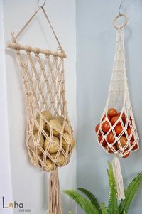 "This lovely Produce Bag, Macrame Fruit Hanging Storage will make it easier for you to store and keep your fruit fresh and easy to grab whenever you need, adding a lovely touch to your kitchen with boho and vintage style  This Fruit and vegetable hanging bags are handcrafted with Eco-Friendly Pure Cotton Cord. It will help you store your vegetables and fruits. Also can use as a plant hanger. Can hang on walls or ceiling.  ☘️DETAIL:   -   Style A: The length of the wooden bar is 10\" ~ 25cm. The