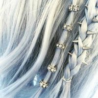 Metal hair accessories. Love love love the spikey braid.