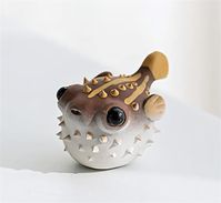 PRICES MAY VARY. 【Exquisite Craftsmanship】✨ This tea pet is made using traditional Yixing Zisha craftsmanship. Every detail is meticulously carved, showcasing the three-dimensional and vivid appearance of the pufferfish. 【Unique Design】🐡 Featuring a pufferfish design, this tea pet is charming and whimsical. The pufferfish symbolizes wealth and good luck, making it a delightful addition to your tea table and a harbinger of good fortune. 【High-Quality Material】🏺 Made from premium Yixing Zisha cl