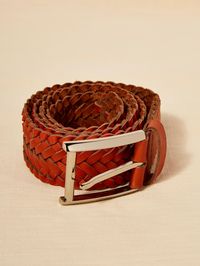 Tan Leather Braided Belt from Apricot Clothing. Beautiful women’s clothing with inspired designs and prints. Great quality women’s wear with free delivery available.