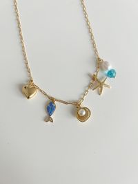 This charm necklace is 18 inches.