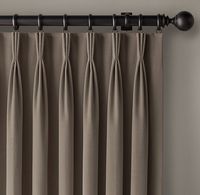 Pleated curtains offer a refined style to a traditional style.