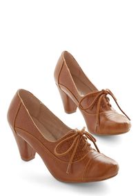 Right Here Heel in Brown. In these delightful, vintage-inspired heels, your presence and fashionable panache will always make itself known. #brown #modcloth