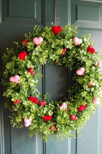 Add pink and red dollar store hearts to a plain wreath